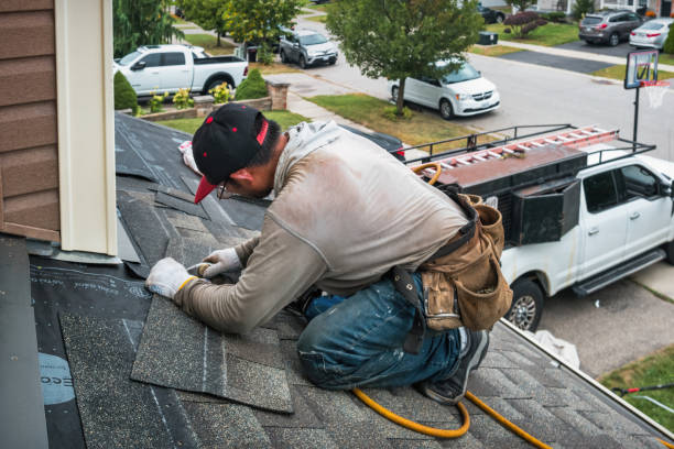 Professional Roofing technician working in Caledonia, WI